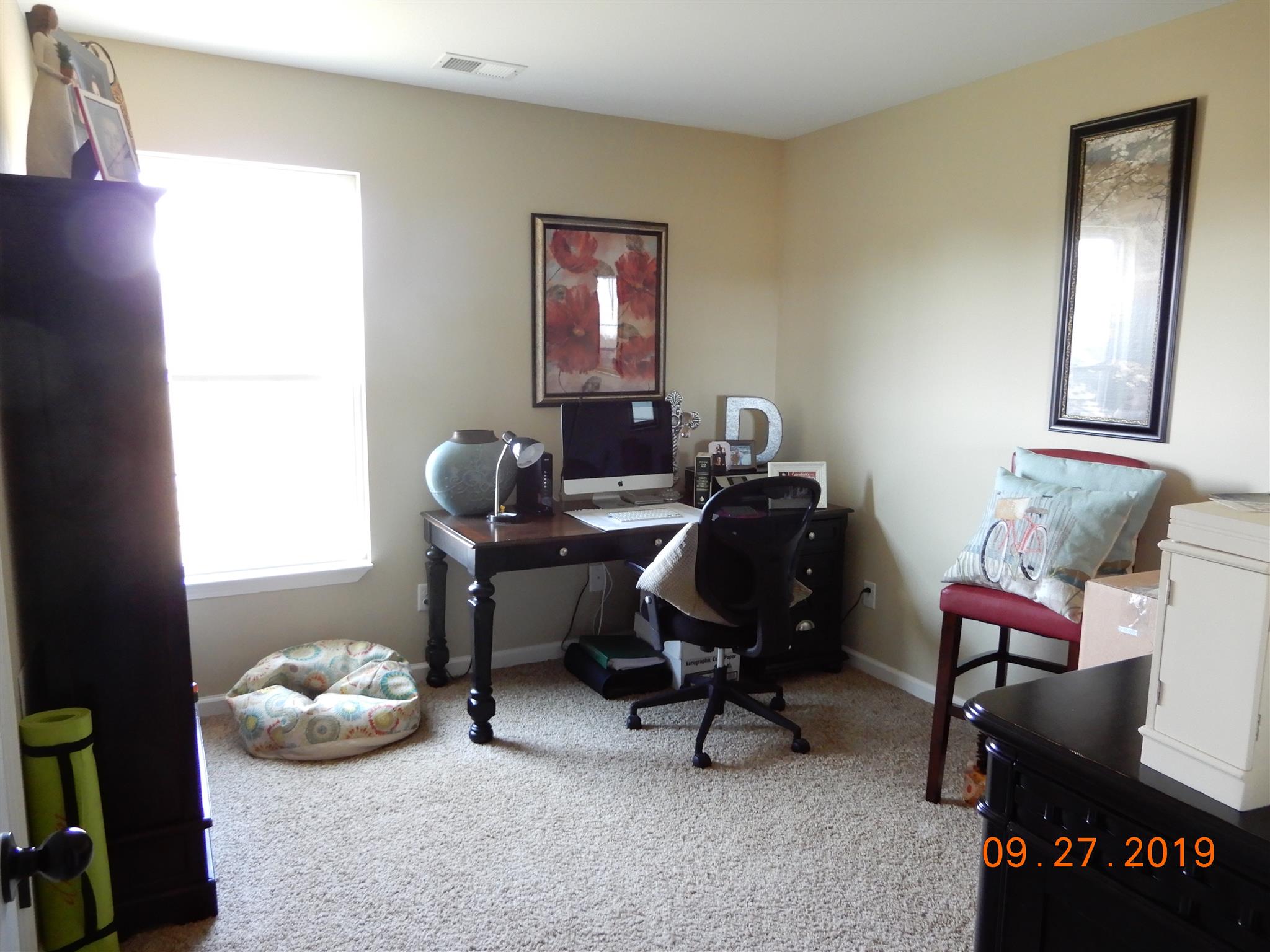 610 Murrell Road Dickson, TN 37055 - Photo 11 of 24 a view of a workspace with furniture and a window