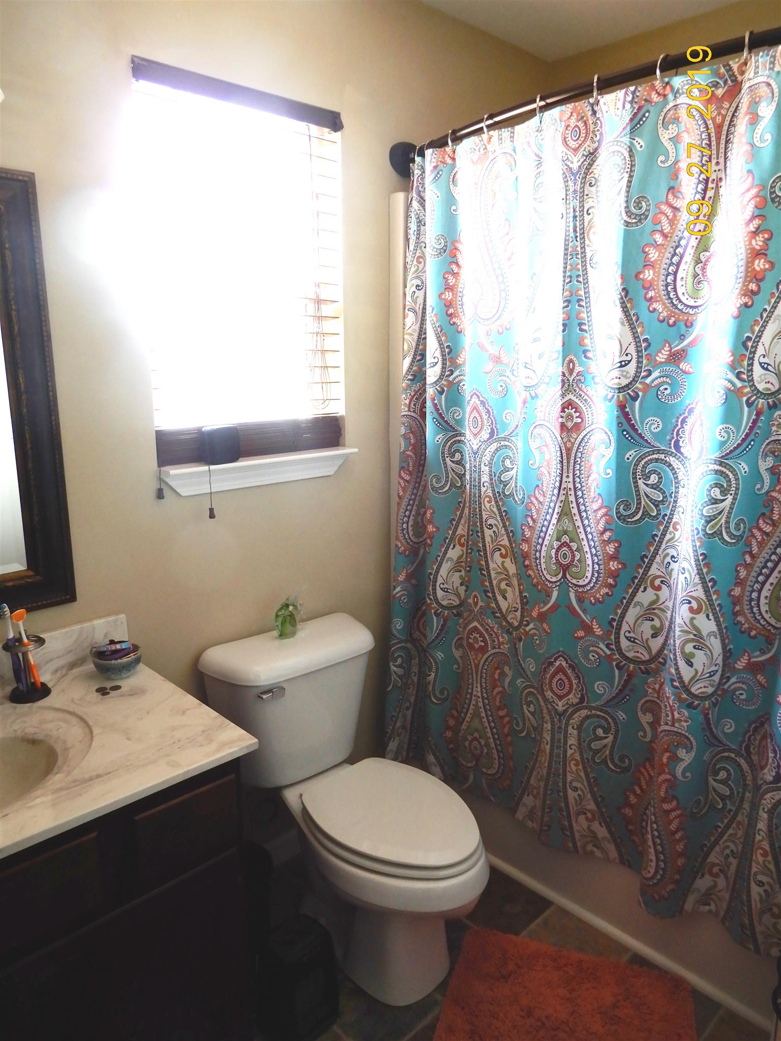 610 Murrell Road Dickson, TN 37055 - Photo 12 of 24 a bathroom with a sink and a toilet