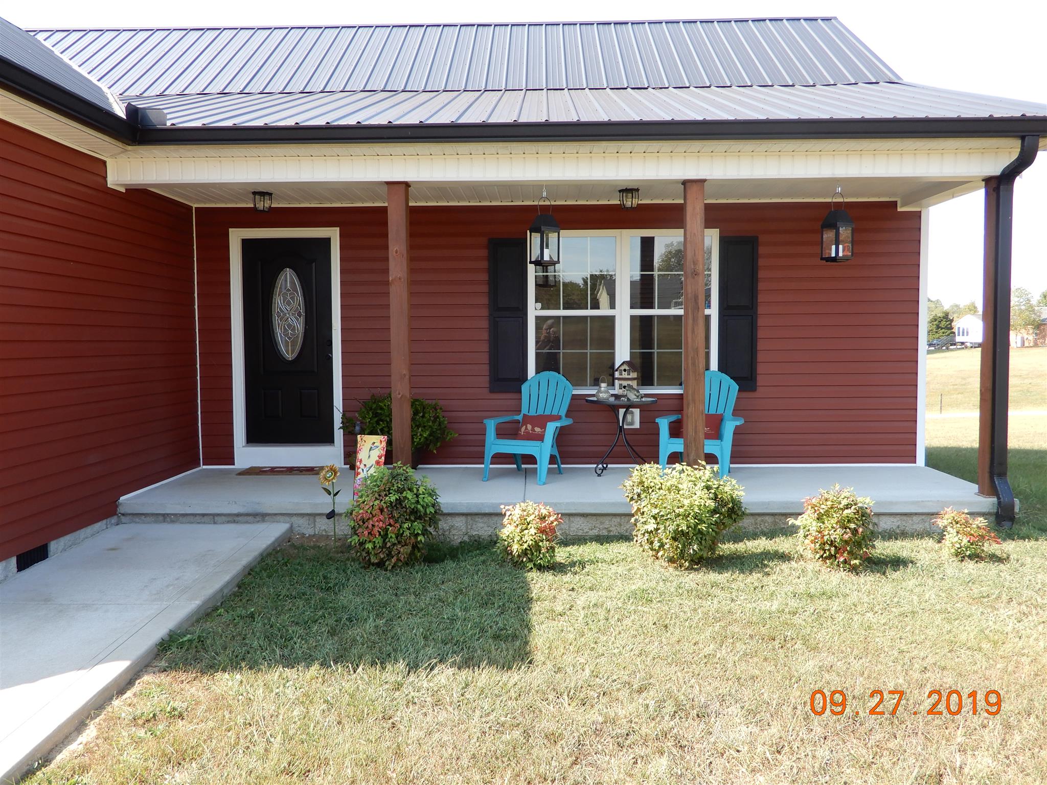 610 Murrell Road Dickson, TN 37055 - Photo 2 of 24 a front view of a house with a porch