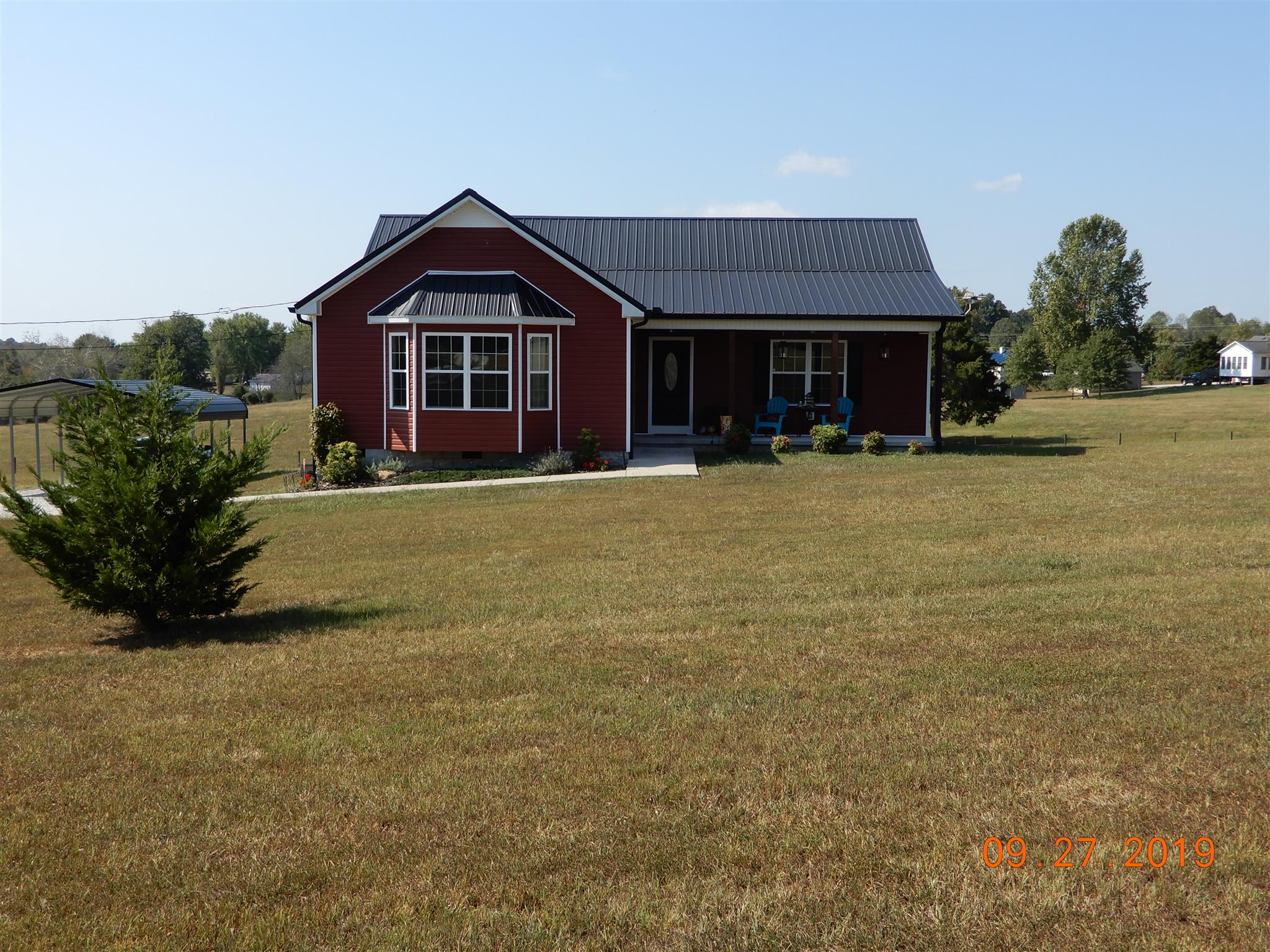 610 Murrell Road Dickson, TN 37055 - Photo 23 of 24 a front view of a house with a yard