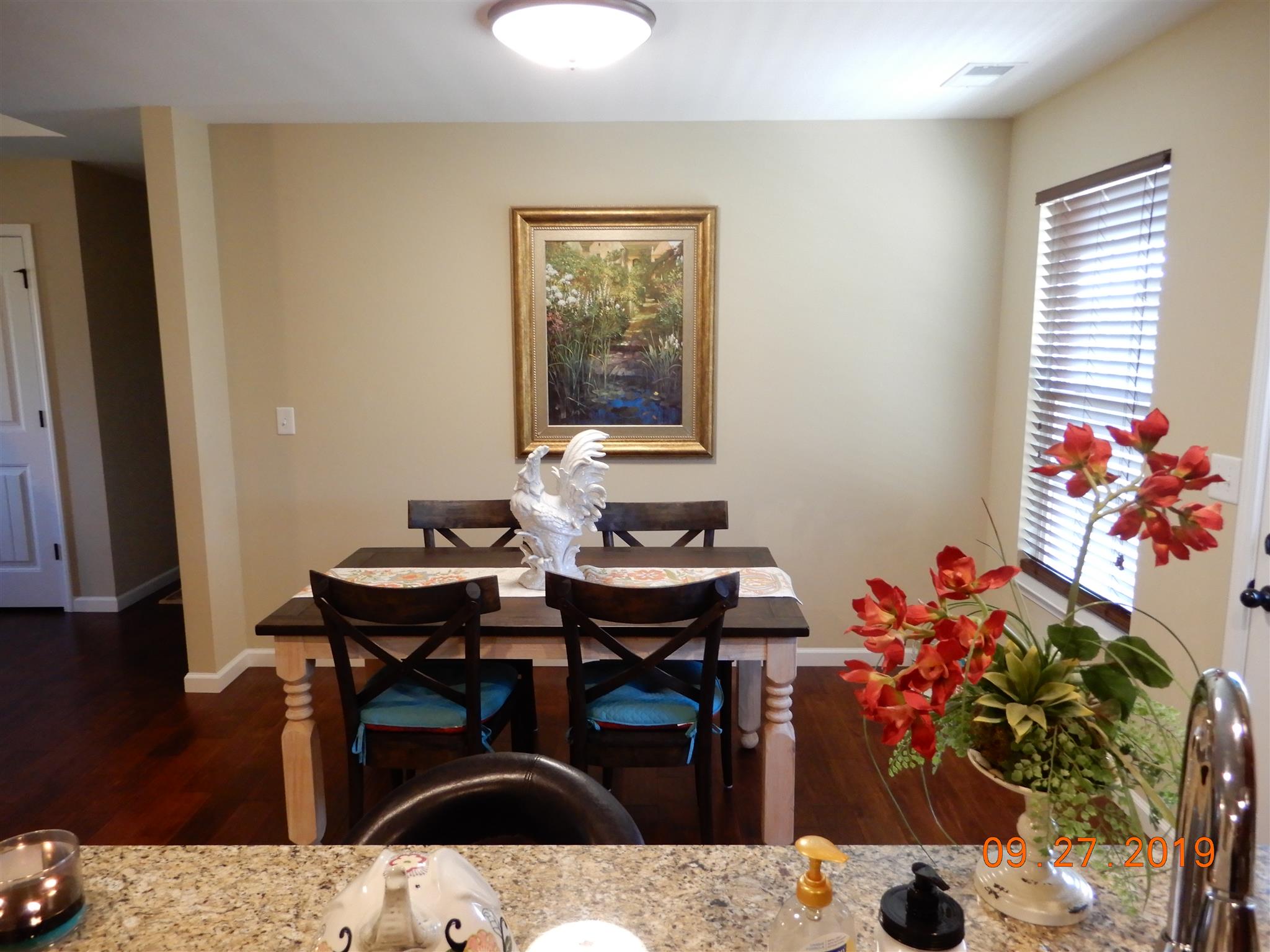 610 Murrell Road Dickson, TN 37055 - Photo 5 of 24 a living room with furniture and flowers