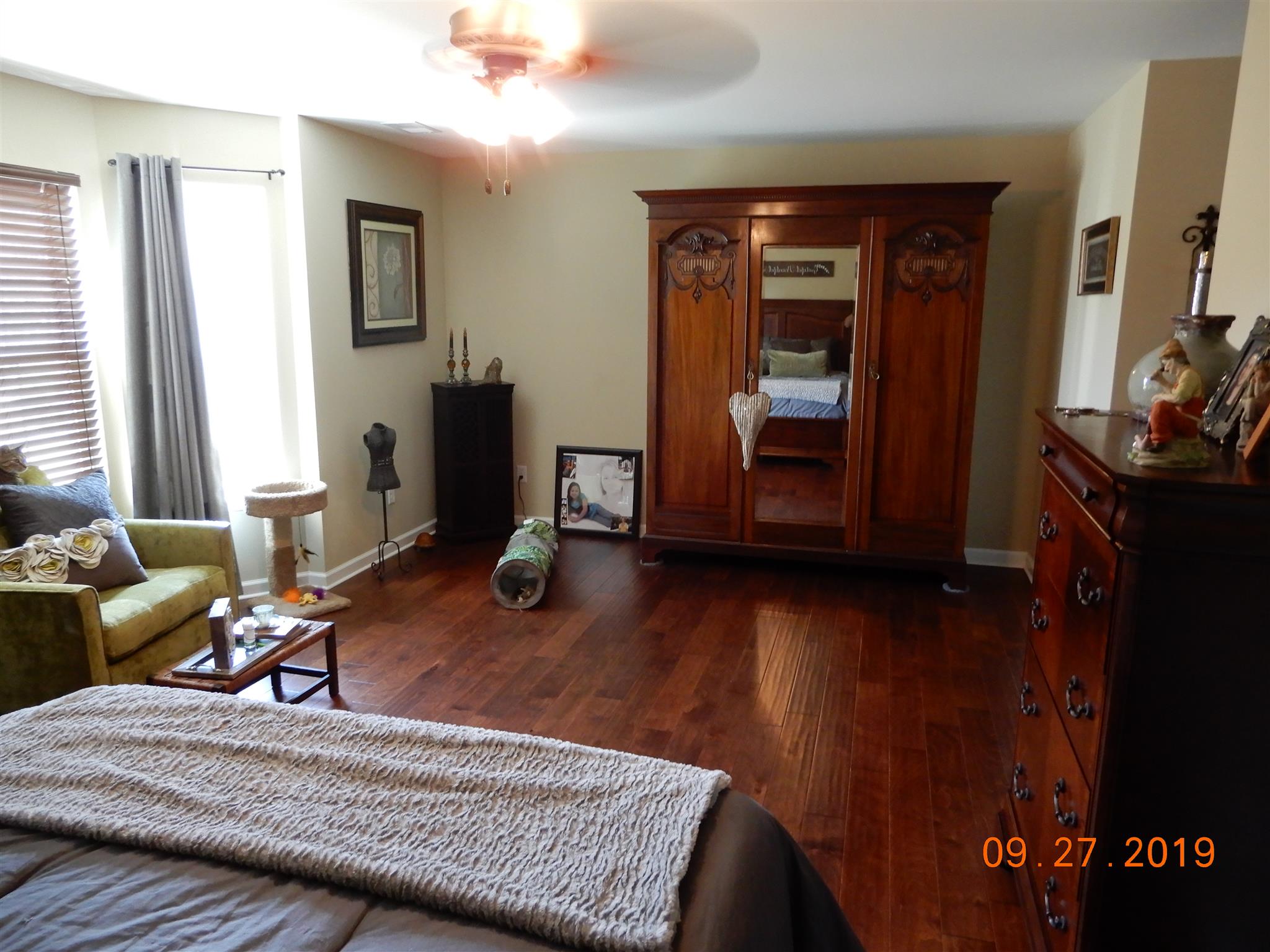 610 Murrell Road Dickson, TN 37055 - Photo 8 of 24 a living room with furniture and a flat screen tv