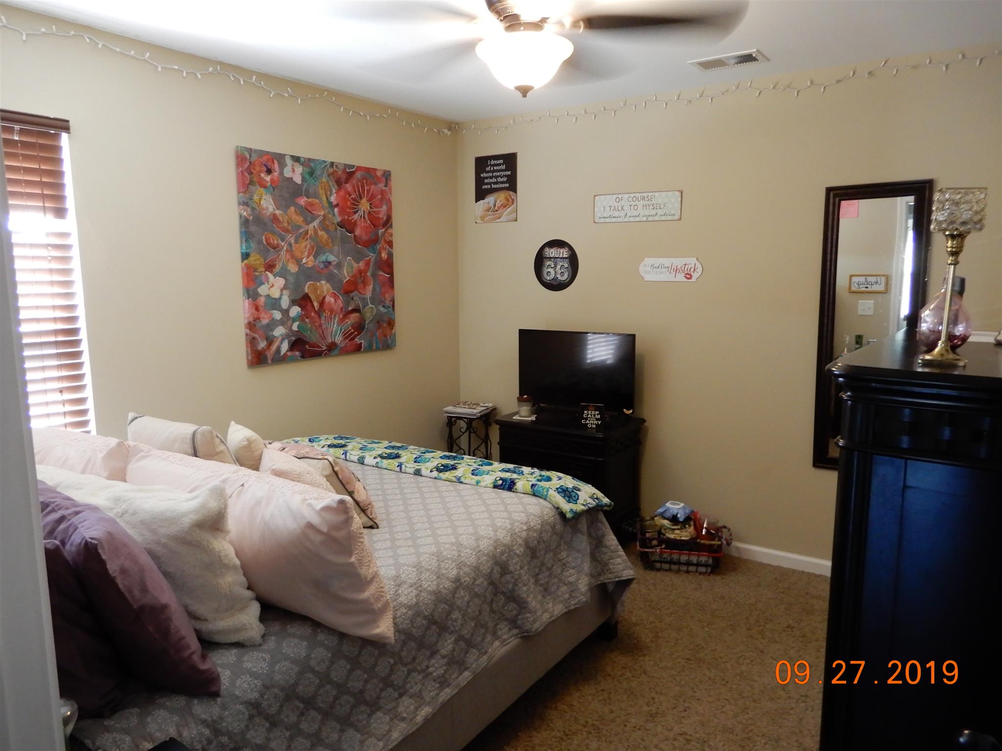 610 Murrell Road Dickson, TN 37055 - Photo 10 of 24 a bedroom with a bed and a television