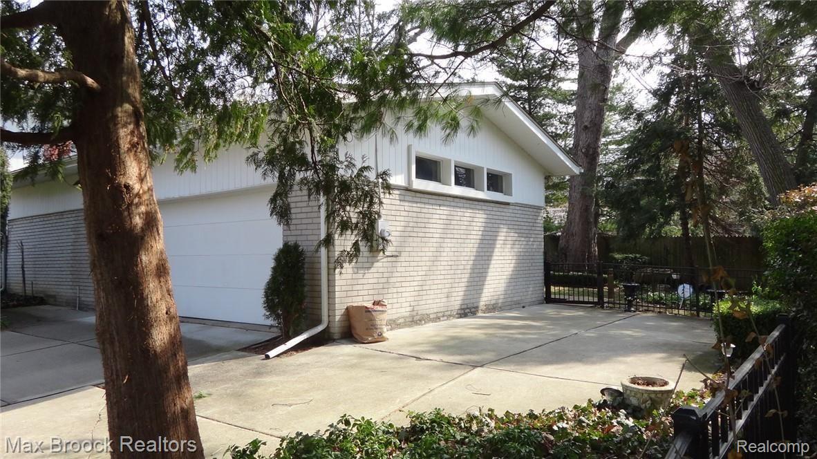 295 Cloverly Road Grosse Pointe, MI 48236 - Photo 4 of 40 Garage and Extended Concrete Driveway