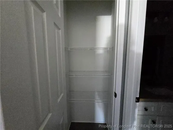 a bathroom with a glass door