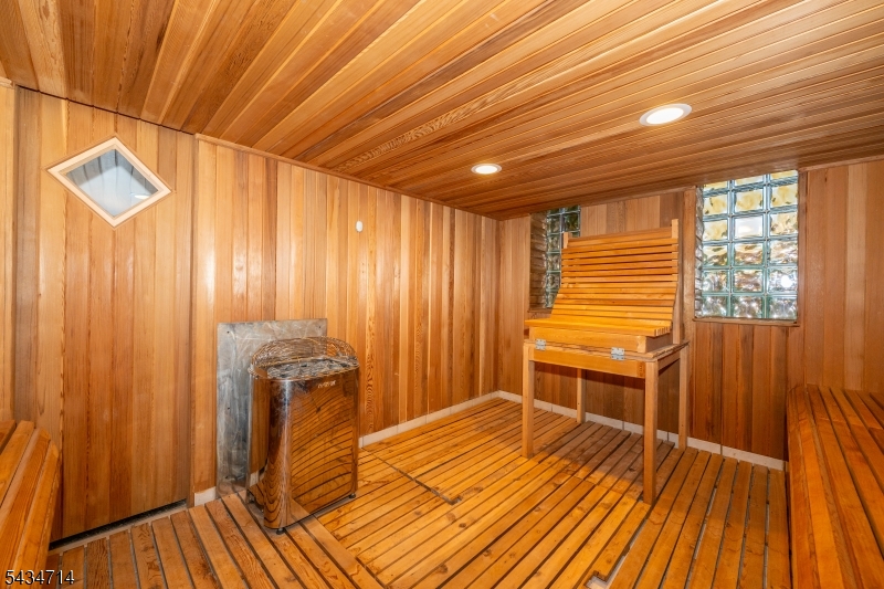 50 Rock Spring Road West Orange, NJ 07052 - Photo 47 of 50 a room with wooden floor and furniture