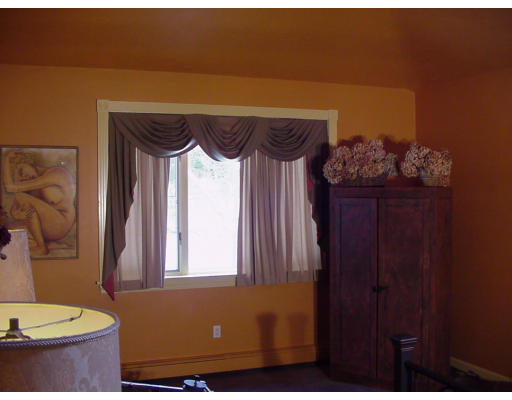 357 Central Street Georgetown, MA 01833 - Photo 13 of 21 a view of a entryway with furniture and wooden floor