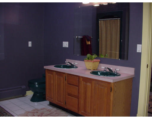 357 Central Street Georgetown, MA 01833 - Photo 16 of 21 a bathroom with a sink and a mirror