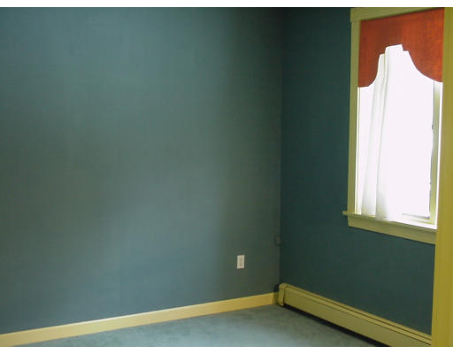 357 Central Street Georgetown, MA 01833 - Photo 18 of 21 a view of a small space with wooden floor and a window