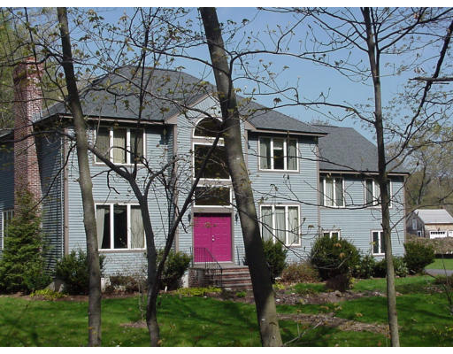357 Central Street Georgetown, MA 01833 - Photo 2 of 21 a view of a house with a yard and plants