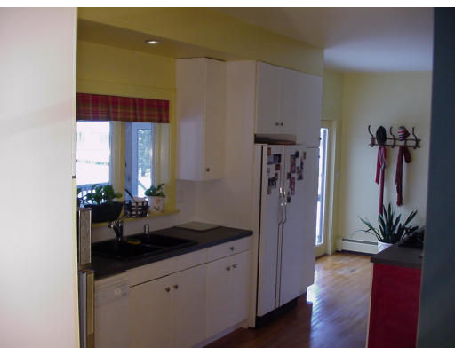 357 Central Street Georgetown, MA 01833 - Photo 3 of 21 a bathroom with a granite countertop sink a mirror and a shower