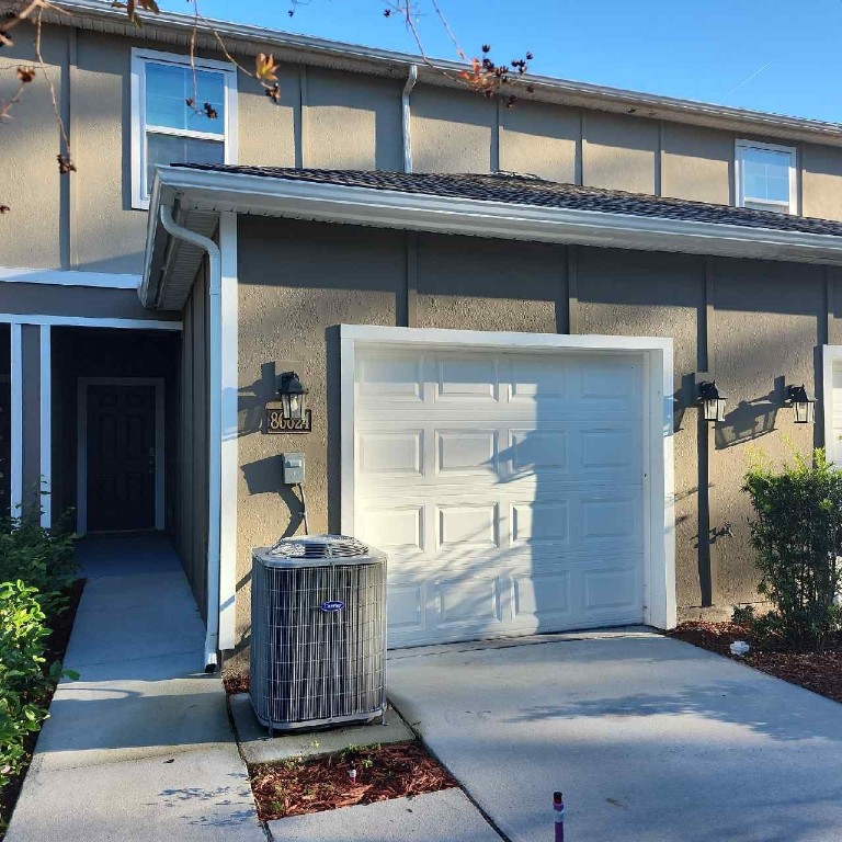 86624 Shortline Circle Yulee, FL 32097 - Photo 1 of 31 a front view of a house with barbeque area
