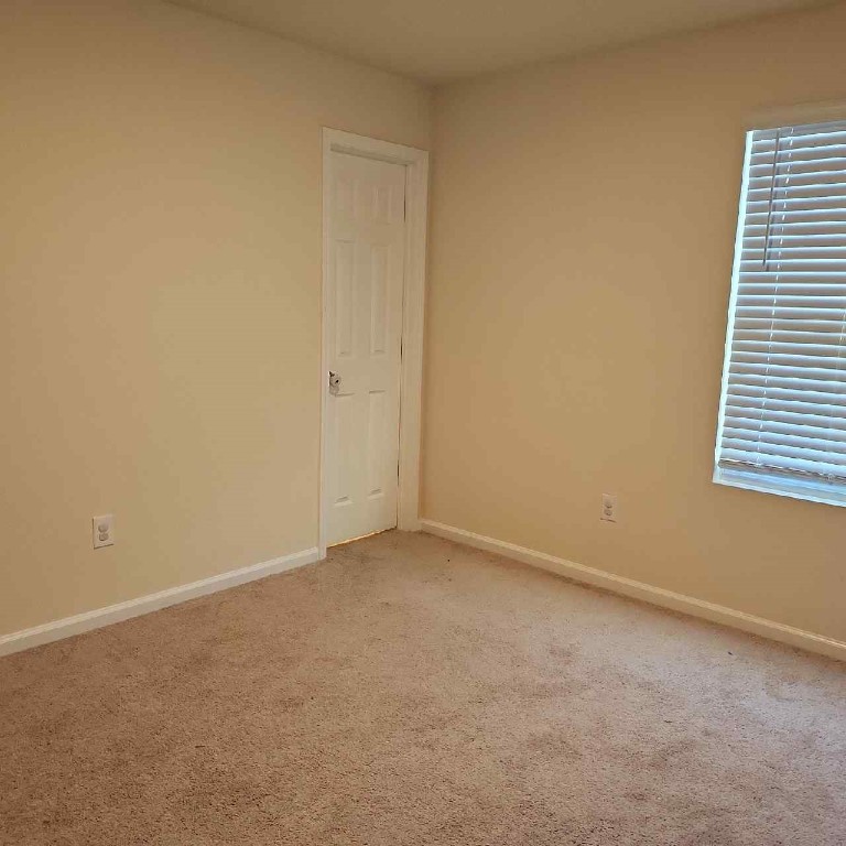 86624 Shortline Circle Yulee, FL 32097 - Photo 11 of 31 an empty room with windows
