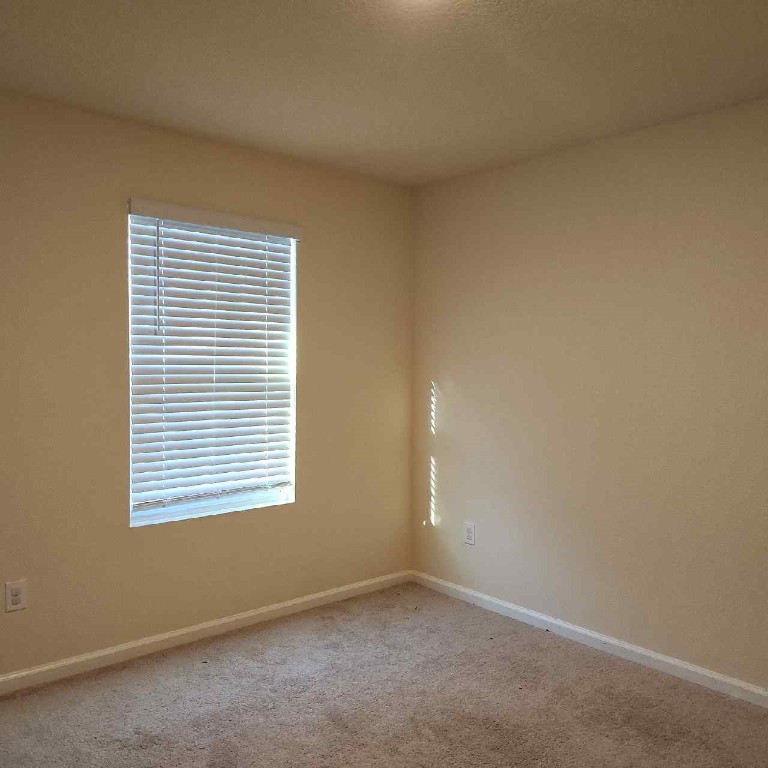 86624 Shortline Circle Yulee, FL 32097 - Photo 14 of 31 an empty room with a window