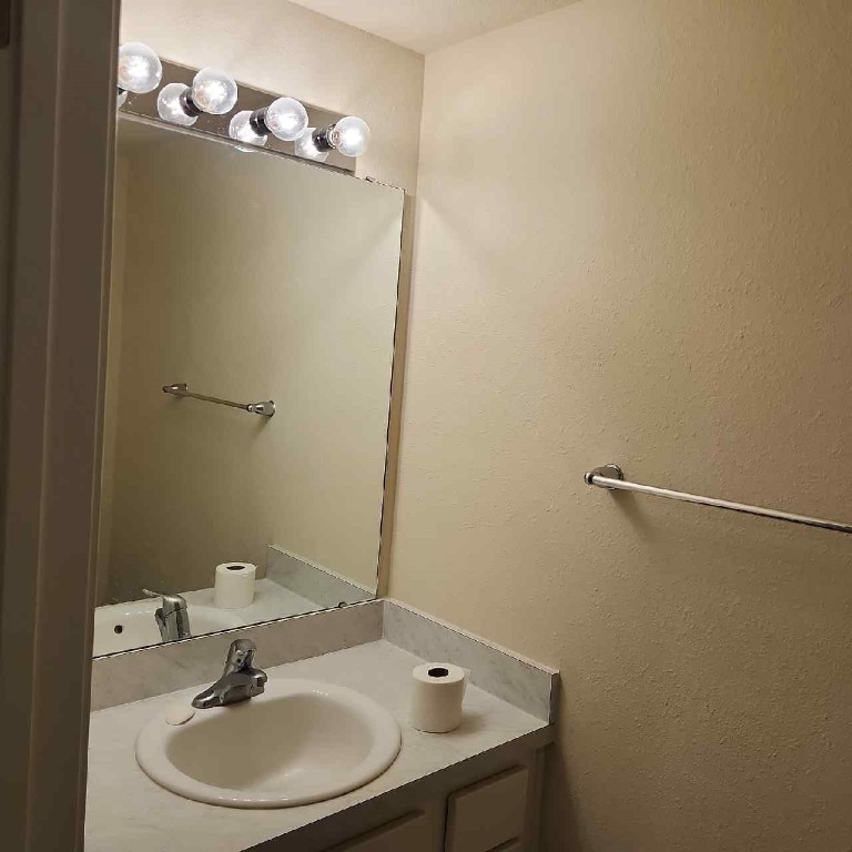 86624 Shortline Circle Yulee, FL 32097 - Photo 24 of 31 a bathroom with a sink and mirror