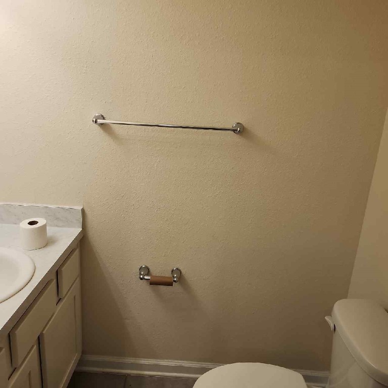 86624 Shortline Circle Yulee, FL 32097 - Photo 25 of 31 a bathroom with a toilet sink and shower