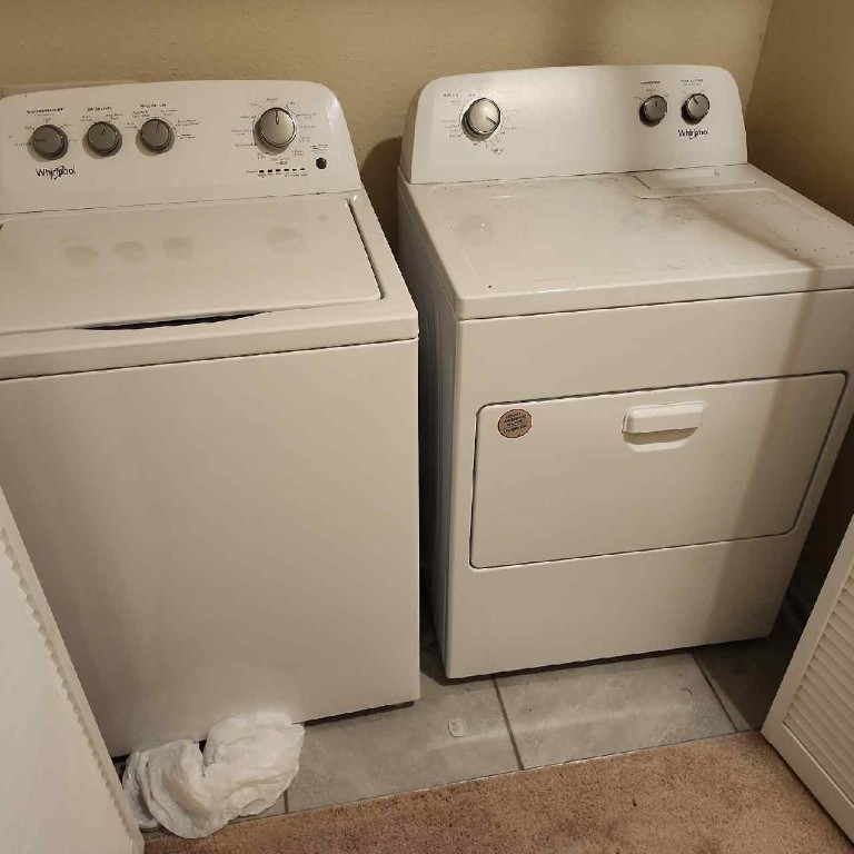 86624 Shortline Circle Yulee, FL 32097 - Photo 26 of 31 a utility room with dryer and washer