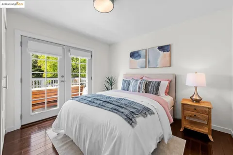 a balcony with table and sofas