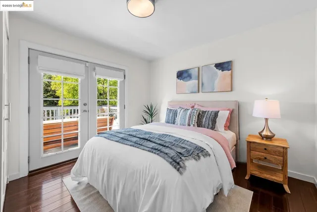 a balcony with table and sofas