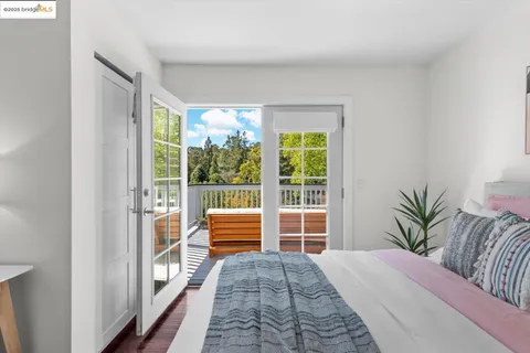 a bedroom with a bed and a lamp