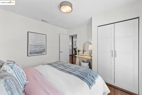a bathroom with a sink mirror and toilet