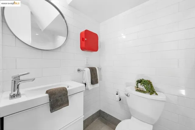 a view of a patio with table and chairs with wooden floor
