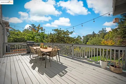 a bedroom with a bed and a chair