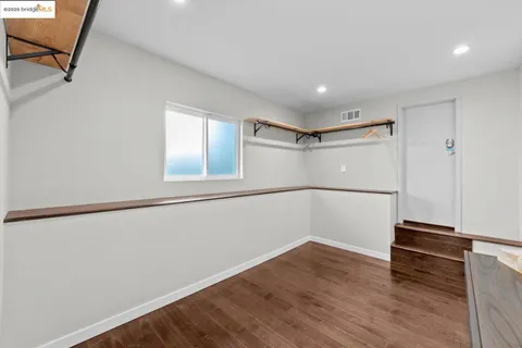 a outdoor space with the couches and dining table with the balcony view