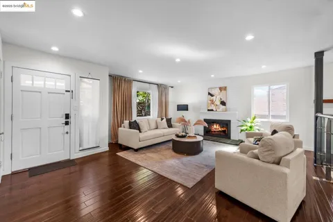 a kitchen with a sink a counter space and stainless steel appliances