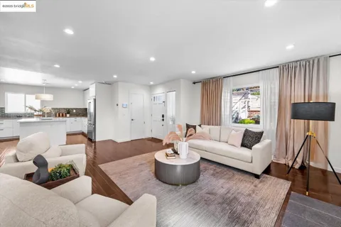 a kitchen with a sink cabinets and window