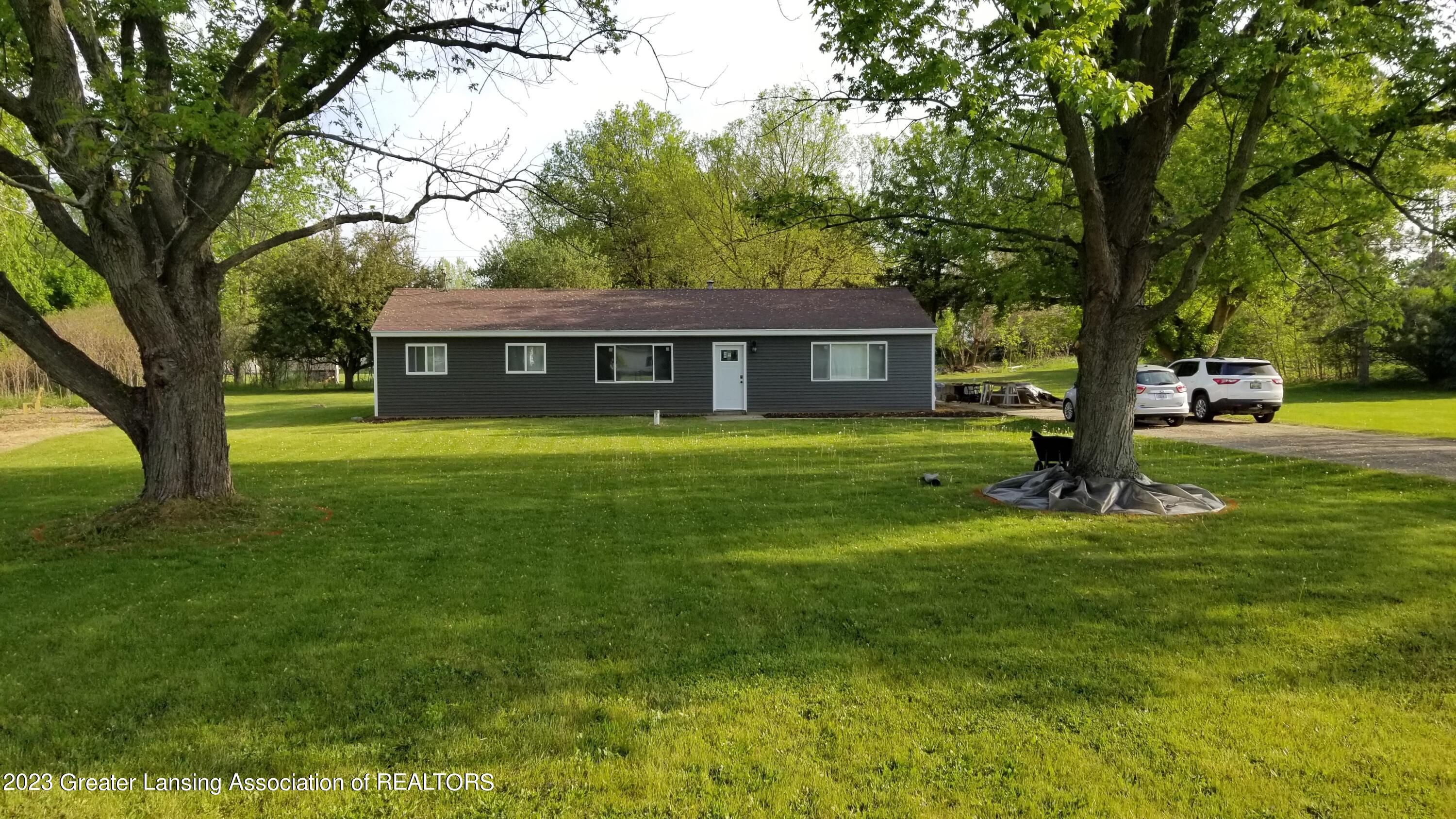 5175 Sleight Road Bath, MI 48808 - Photo 2 of 29 gray house