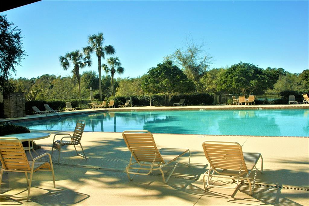 1809 Southwest 29th Street Ocala, FL 34471 - Photo 9 of 20 a view of a lake with a table and chairs