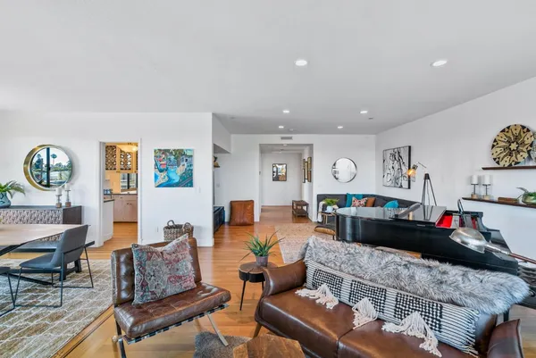 a living room with furniture and a table