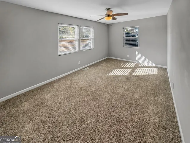 an empty room with windows