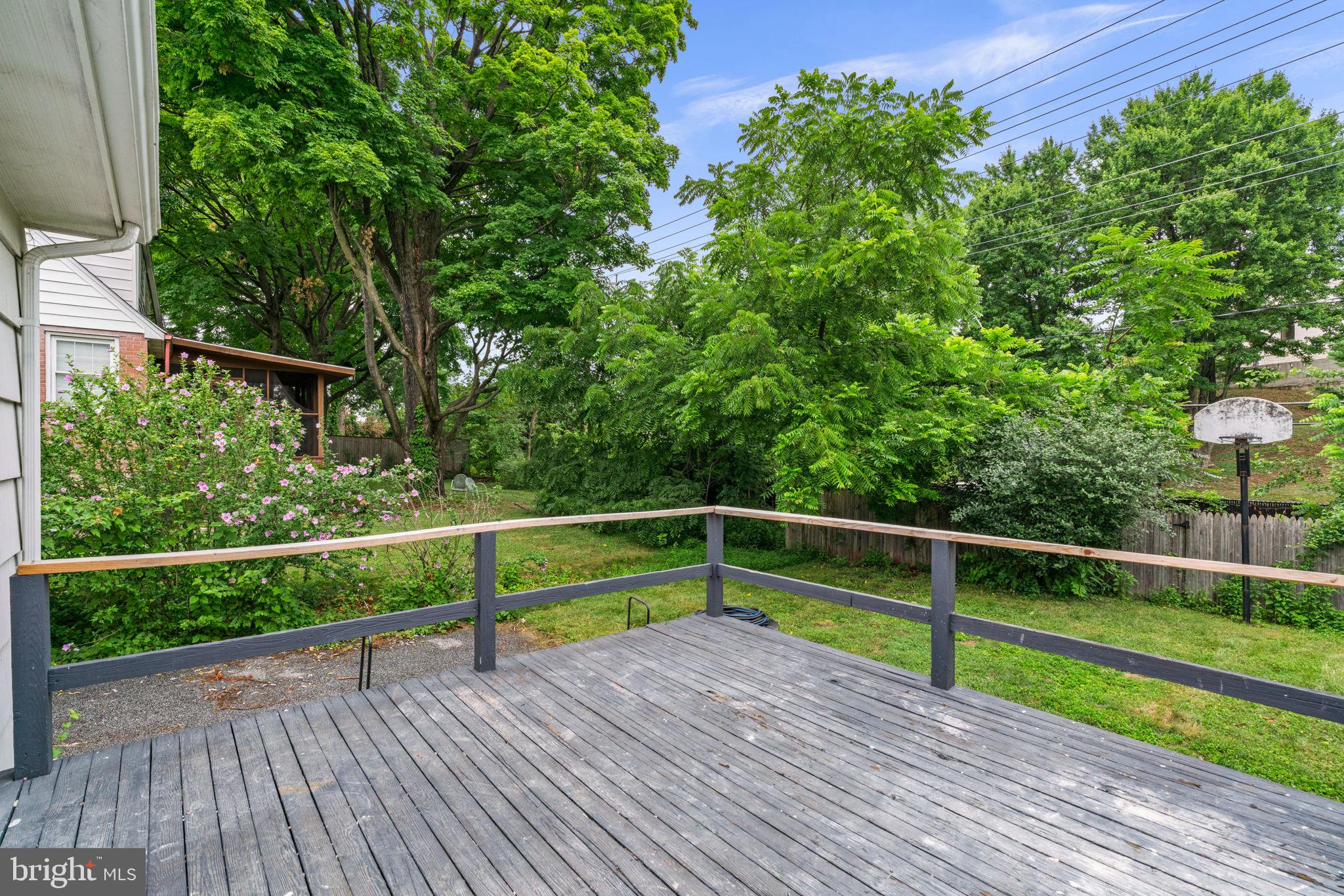 577 Brook Road Towson, MD 21286 - Photo 40 of 49 Serene deck overlooking lush greenery.