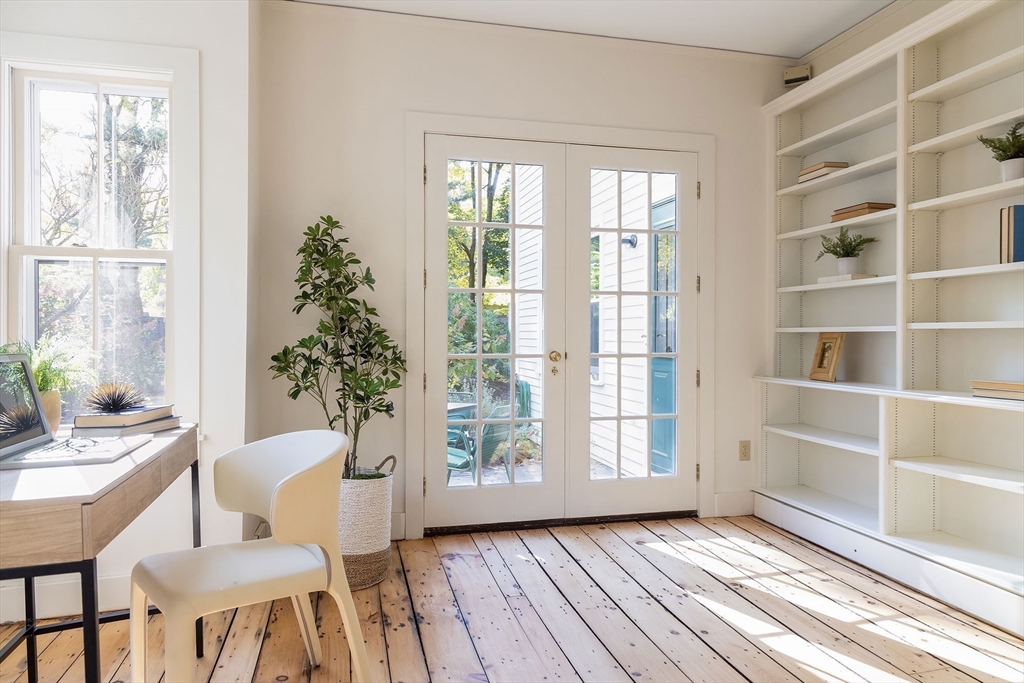 855 Barretts Mill Road Concord, MA 01742 - Photo 3 of 15 a view of a livingroom with furniture and a window