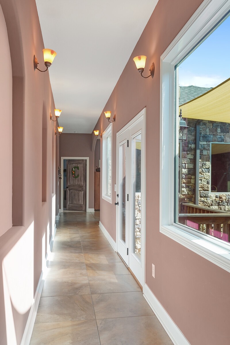 4785 Pulliam-Hardaway Road Springfield, TN 37172 - Photo 12 of 45 a view of a hallway with wooden floor and staircase