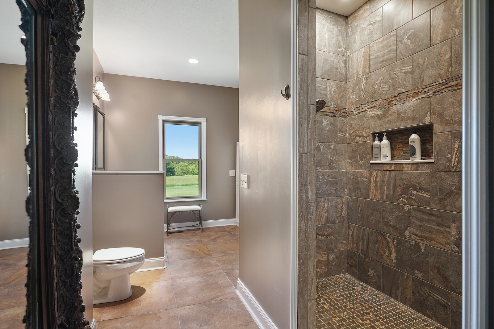 4785 Pulliam-Hardaway Road Springfield, TN 37172 - Photo 31 of 45 a bathroom with a toilet and a shower