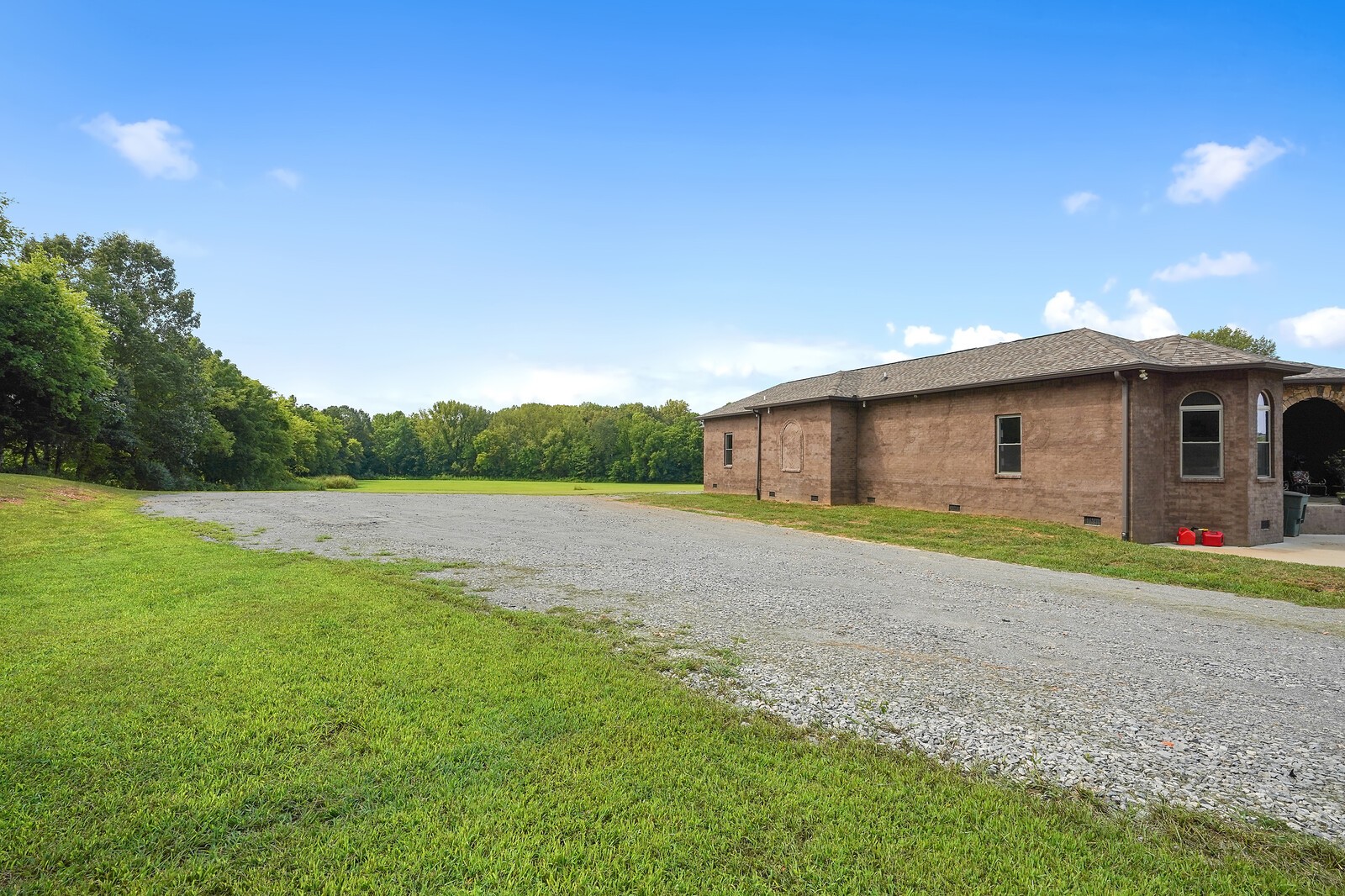 4785 Pulliam-Hardaway Road Springfield, TN 37172 - Photo 43 of 45 a view of a house with backyard and a garden