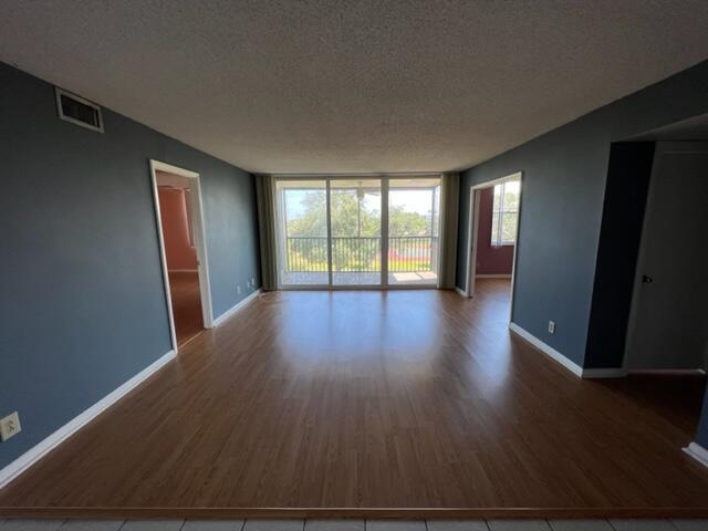 5260 Northwest 2nd Avenue, Unit 404 Boca Raton, FL 33487 - Photo 2 of 23 Enter Living room with split bedrooms