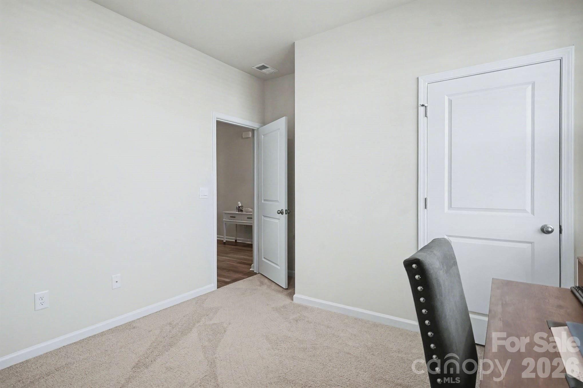 8093 Bear Claw Way Conway, SC 29526 - Photo 13 of 29 a view of chair and cabinet