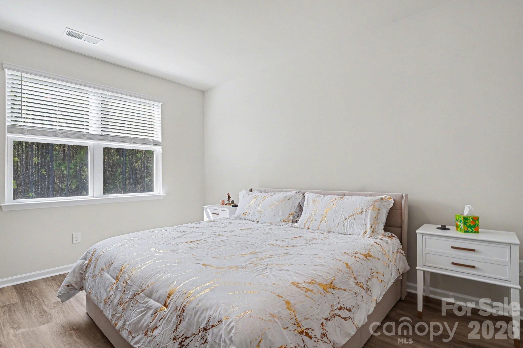 8093 Bear Claw Way Conway, SC 29526 - Photo 14 of 29 a bedroom with a bed and a window