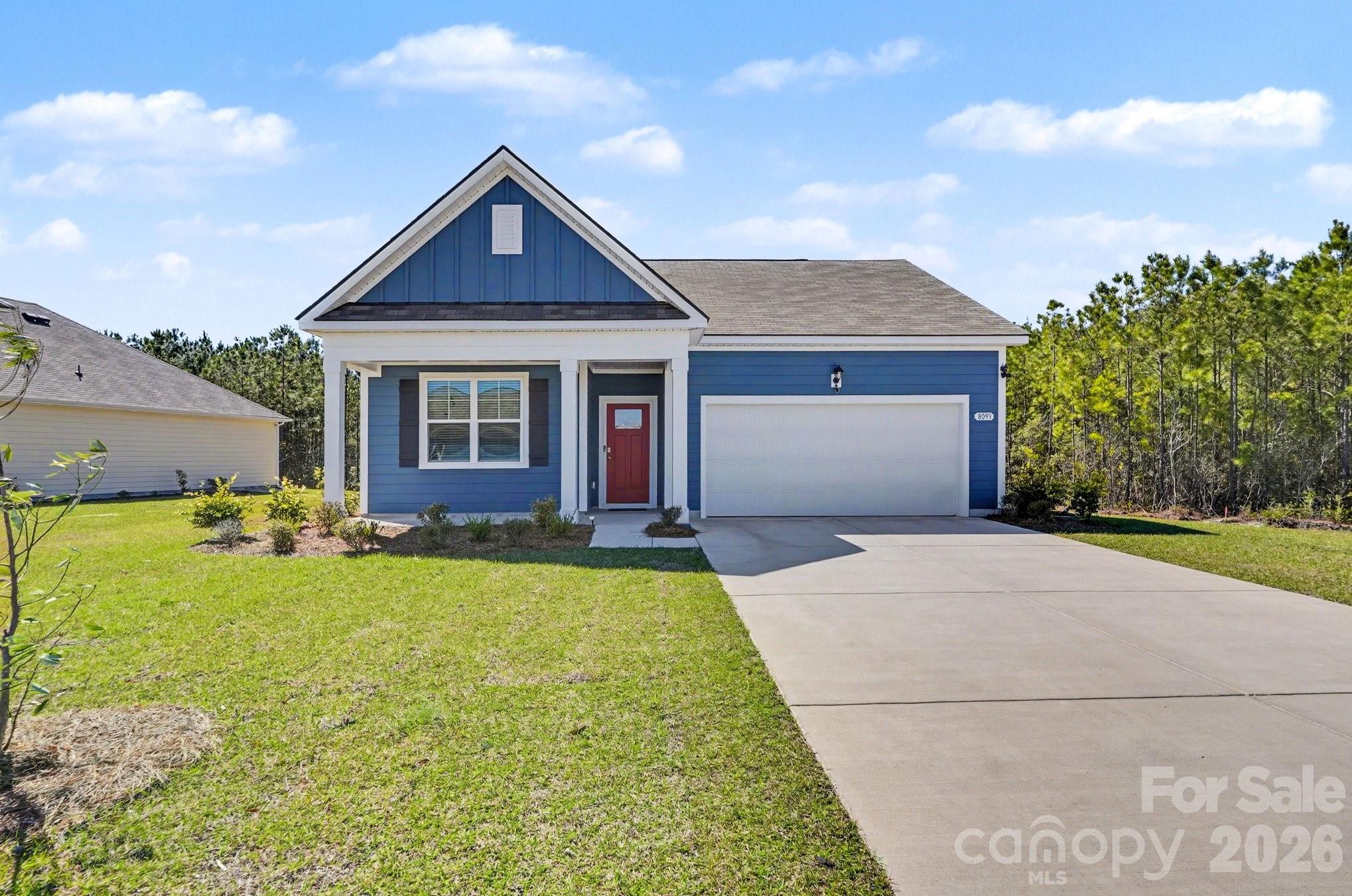 8093 Bear Claw Way Conway, SC 29526 - Photo 2 of 29 a front view of a house with garden
