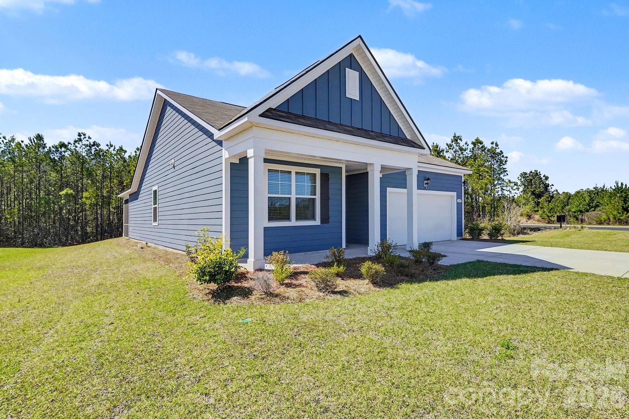 8093 Bear Claw Way Conway, SC 29526 - Photo 3 of 29 a front view of the house with yard
