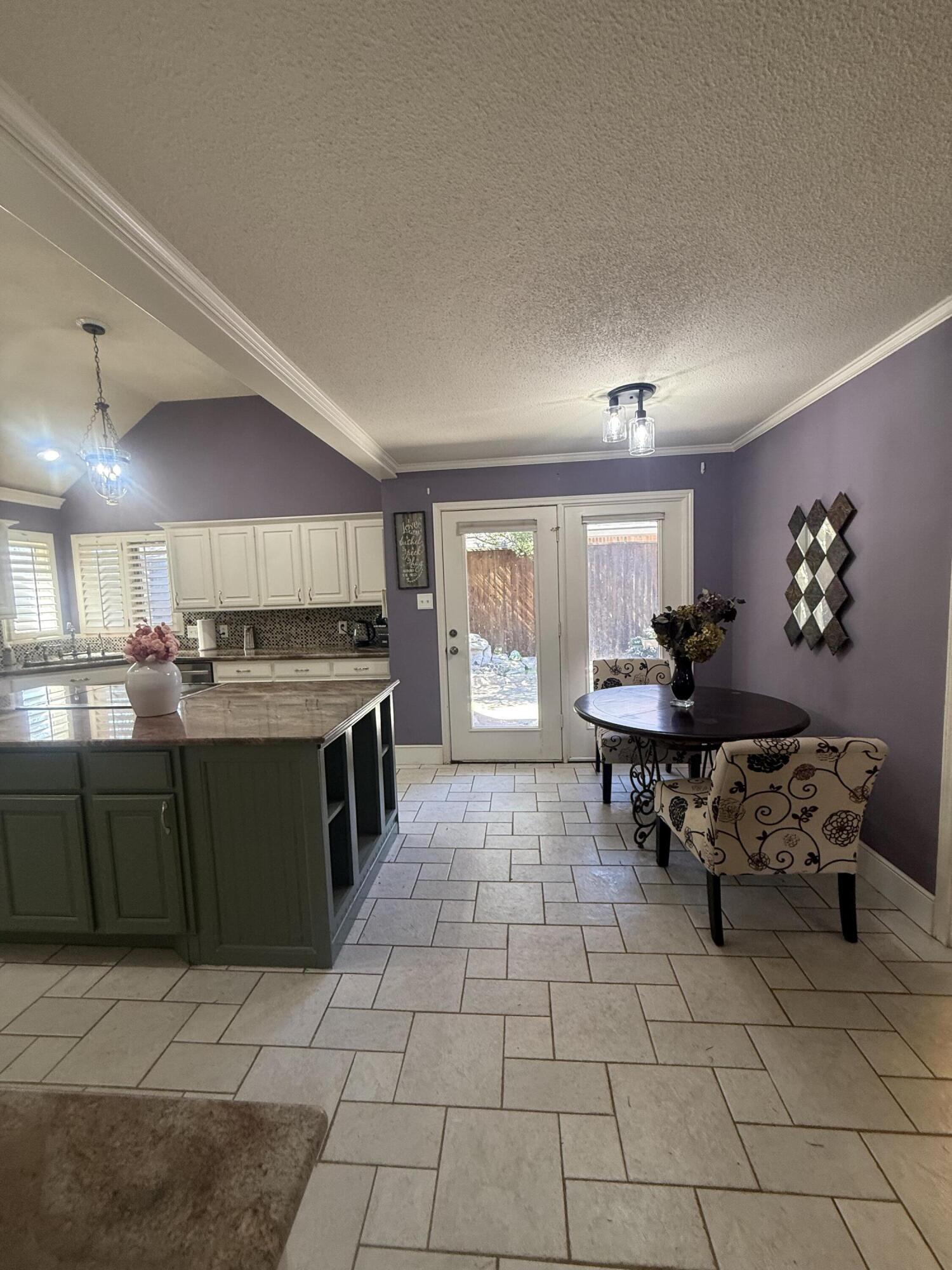 4810 99th Street Lubbock, TX 79424 - Photo 8 of 48 a kitchen with stainless steel appliances granite countertop a sink and cabinets