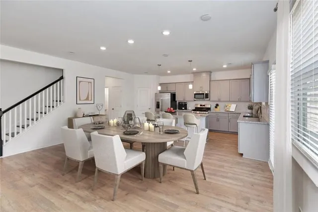 a view of a dining room with furniture