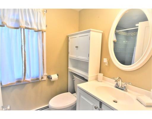 3 Highview Road Rockport, MA 01966 - Photo 20 of 41 a bathroom with a sink a toilet and a mirror