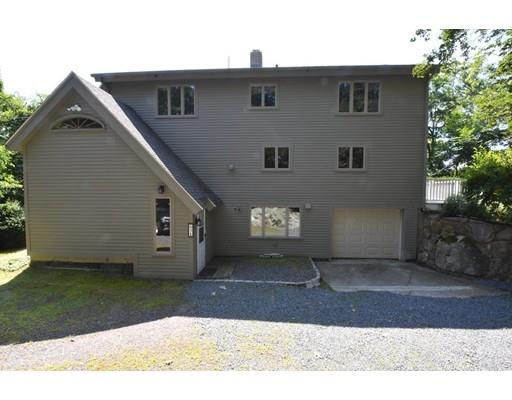 3 Highview Road Rockport, MA 01966 - Photo 36 of 41 a front view of a house with a yard