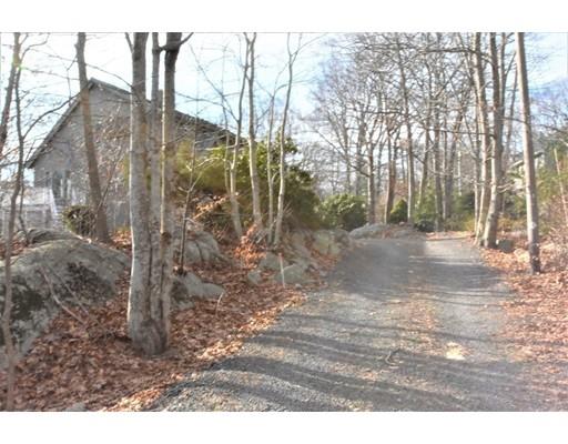 3 Highview Road Rockport, MA 01966 - Photo 6 of 41 a view of a yard with trees in the background