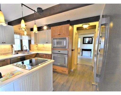 3 Highview Road Rockport, MA 01966 - Photo 10 of 41 a kitchen that has a lot of cabinets in it